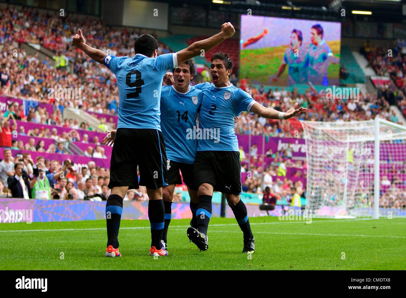 26.07.2012 Manchester, England. Uruguay midfielder Nicolás Lodeiro celebrates his winning goal during the first round group A mens match between United Arab Emirates and Uruguay at Old Trafford. Stock Photo