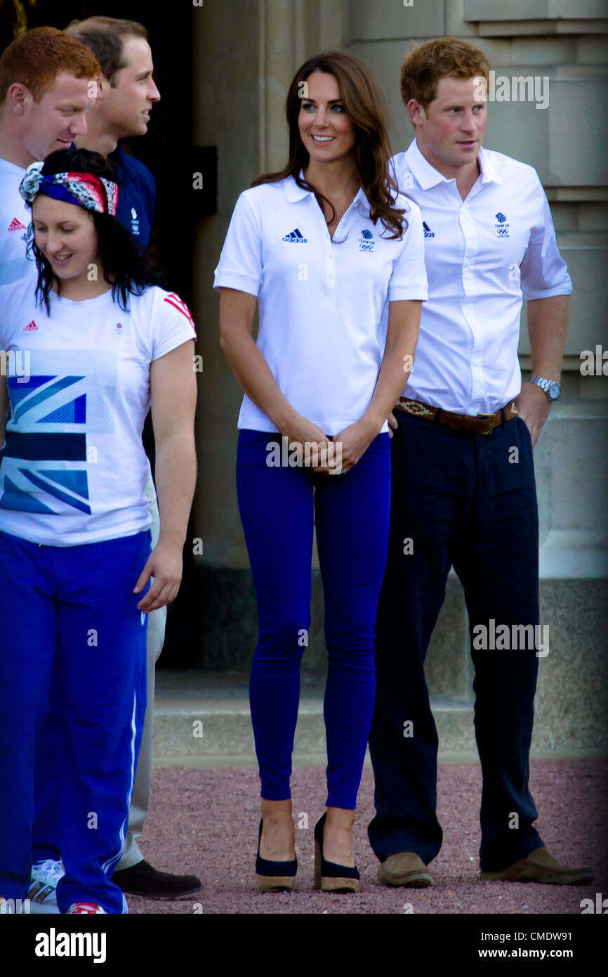 26th July 2012:  Kate Middleton, Prince William and Prince Harry Meet the Olympic flame outside Buckingham Palace. Stock Photo