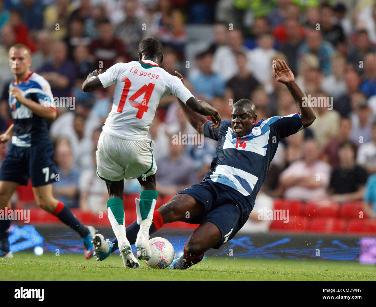 MICAH RICHARDS GOES IN HARD ON GREAT BRITAIN V SENEGAL OLD TRAFFORD MANCHESTER ENGLAND 26 July 2012 Stock Photo
