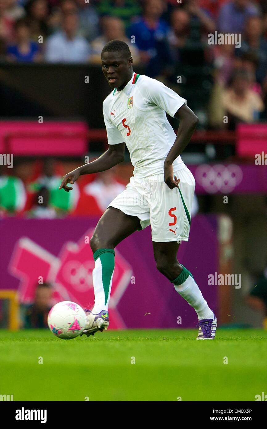 26.07.2012 Manchester, England. Senegal defender Papa Gueye in action during the first round group A mens match between Team GB and Senegal. Stock Photo