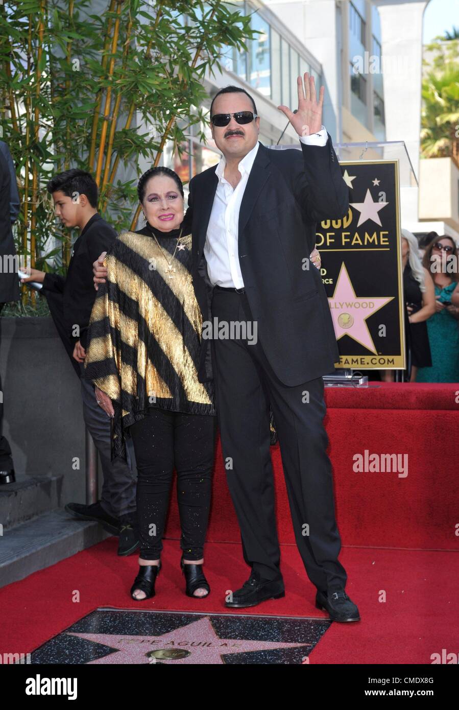 Pepe Aguilar, mother Flor Silvestre at the induction ceremony for Star