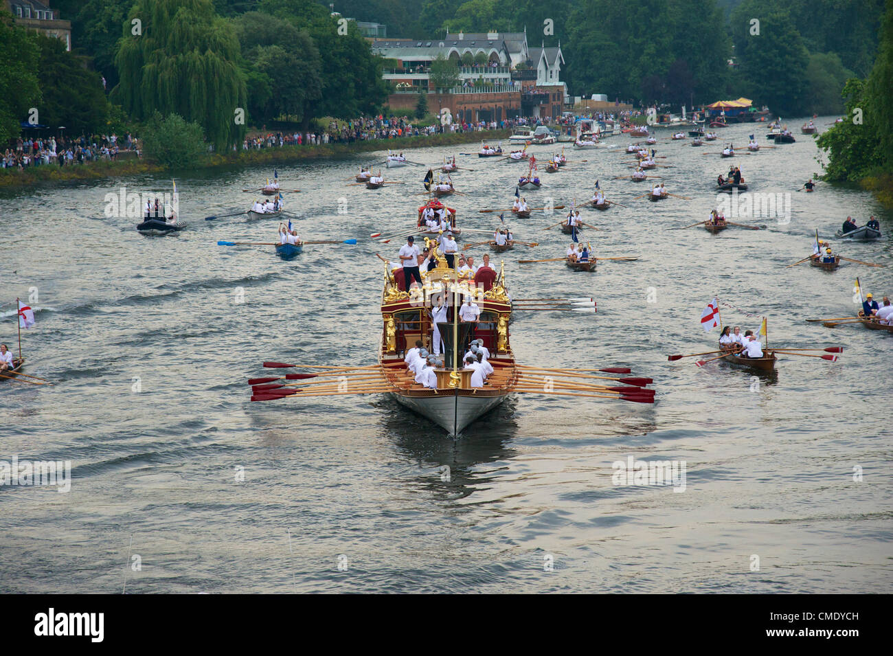 Royal barge Gloriana passes along the Thames through Richmond on its