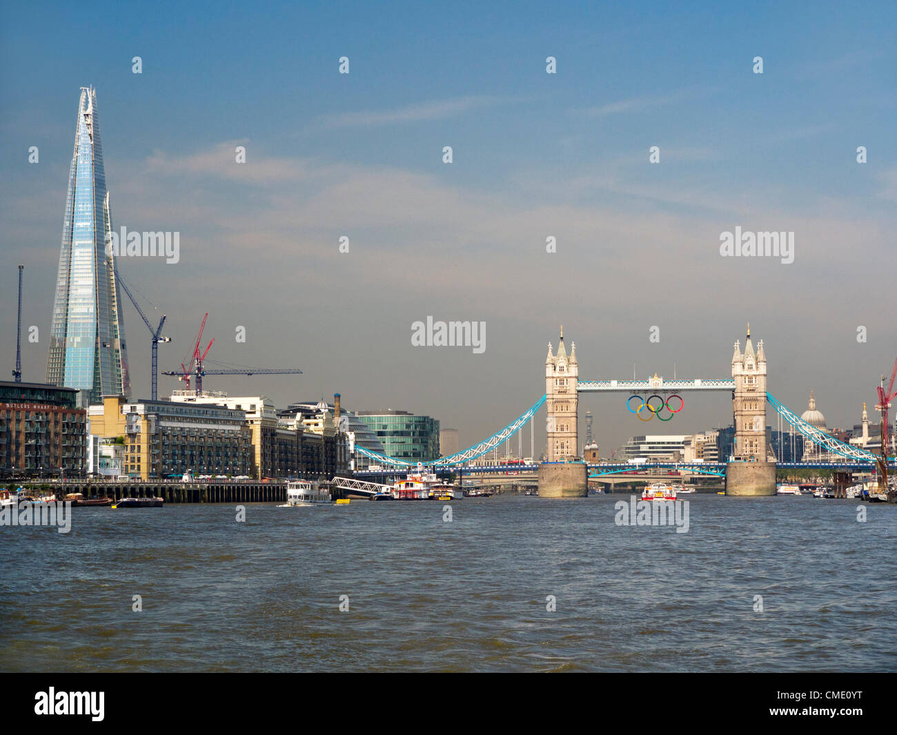 London, UK. 25 July, 2012. The Shard and Tower Bridge, London, with Olympic Rings Stock Photo