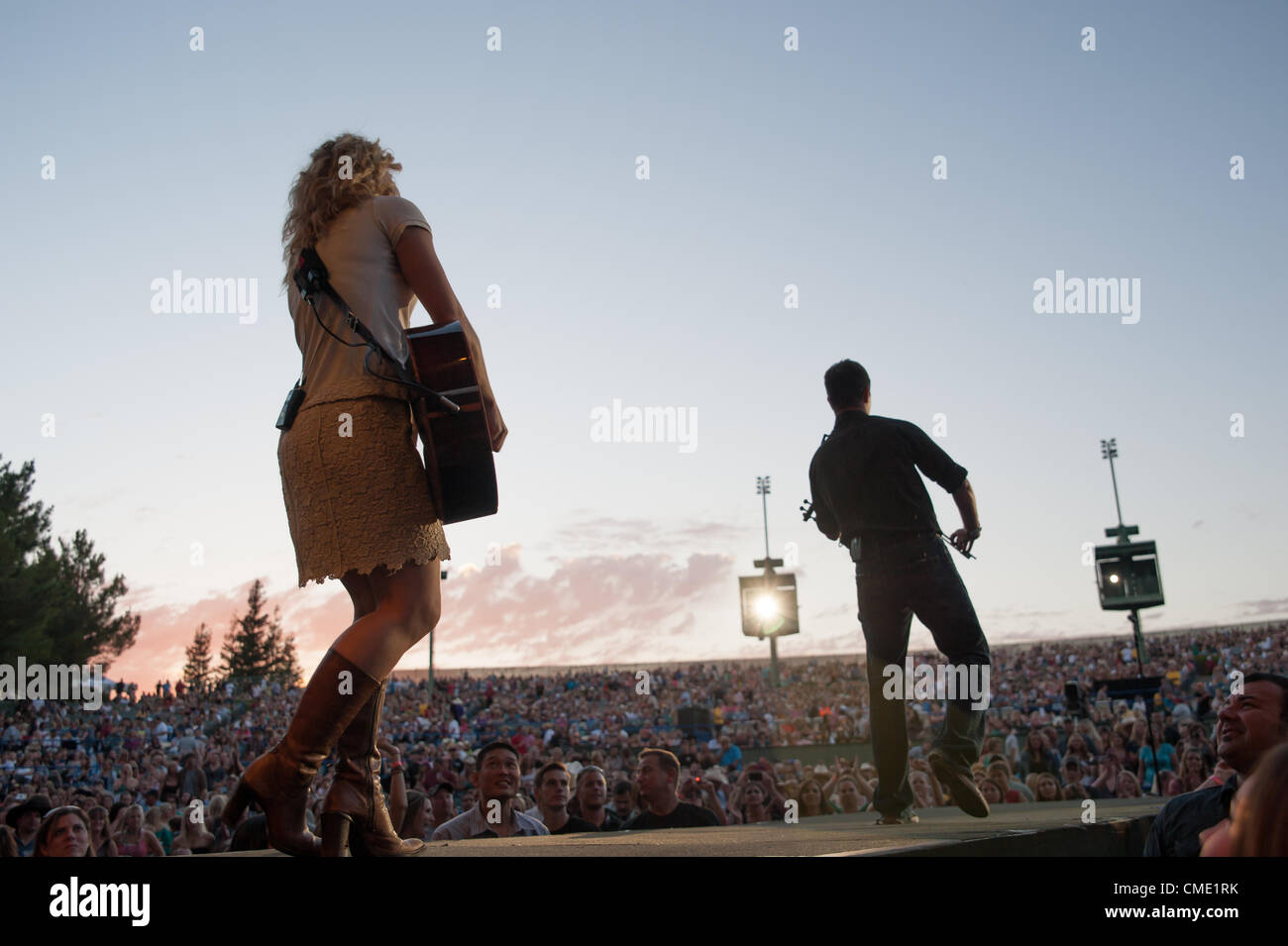 WHEATLAND, CA – July 23: The Band Perry opens for Brad Paisley for The Escape Virtual Reality World Tour at Sleep Train Amphitheater in Wheatland, California on July 23, 2011 Stock Photo