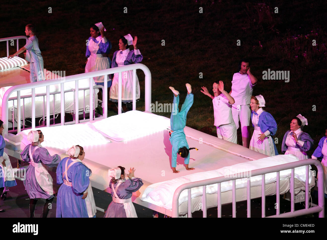 DANCING NURSES & CHILDREN WITH TRAMPOLINE BED LONDON 2012 OPENING