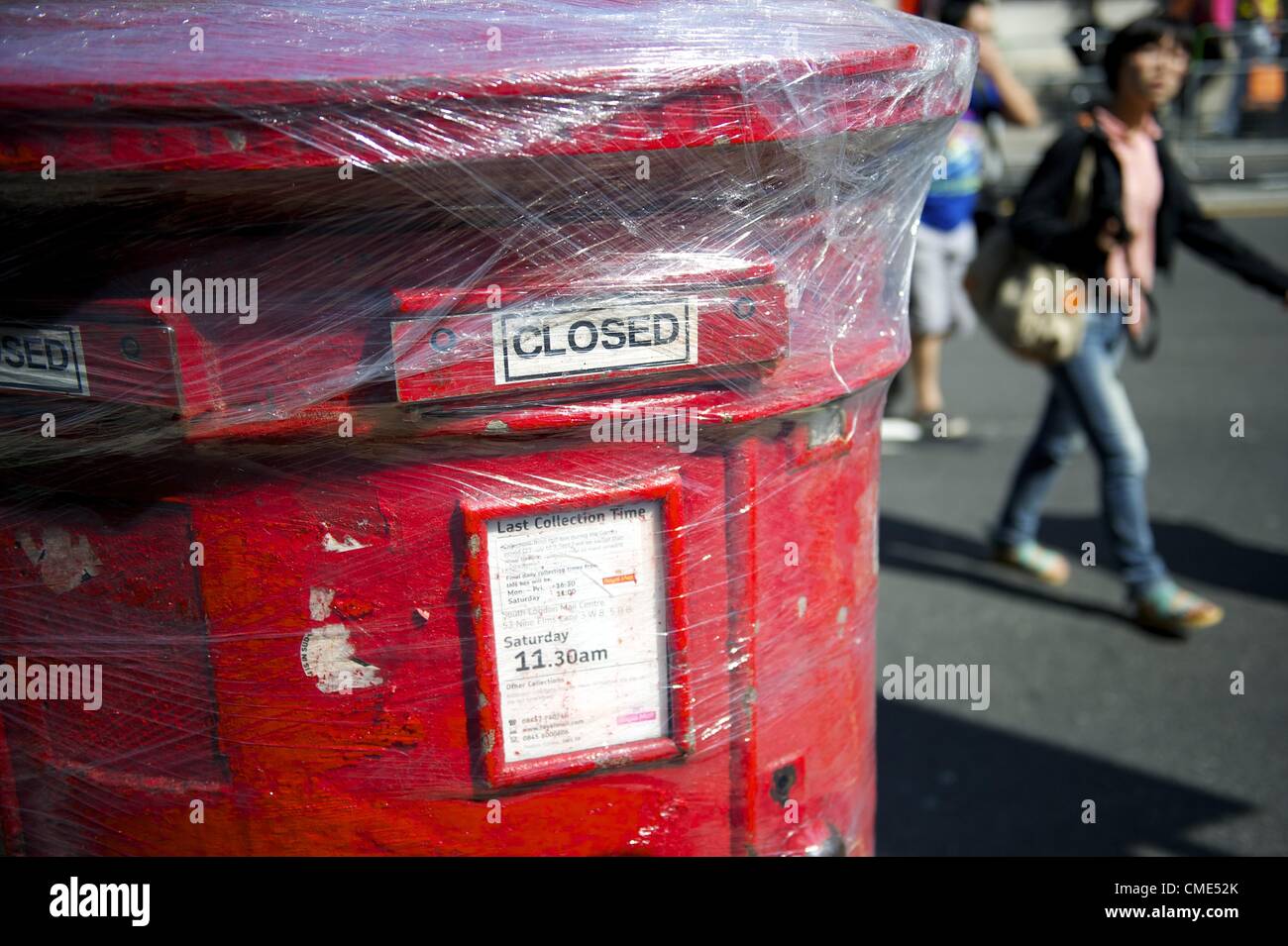 July 28, 2012 - London, England, UK - A mailbox is covered in plastic wrap as a security measure during the 2012 London Summer Olympic Games. (Credit Image: © Mark Makela/ZUMAPRESS.com) Stock Photo