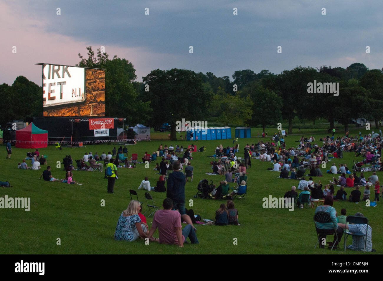 friends-and-family-young-and-old-watching-the-london-olympic-opening
