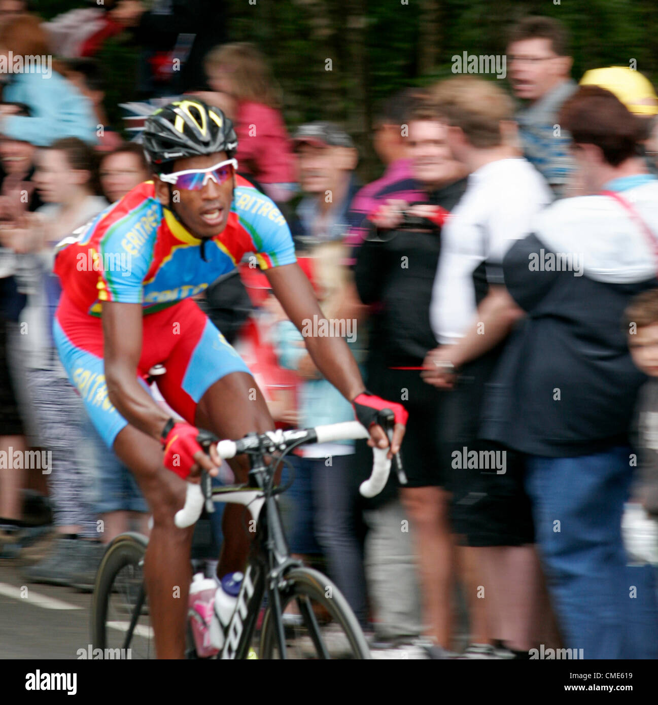 Eritrean cyclist Daniel Teklehaimanot taking part in the Olympic road race on box hill in Surrey which was attended by massive crowds who were cheering them on the 28th July 2012 aiming to win gold Stock Photo