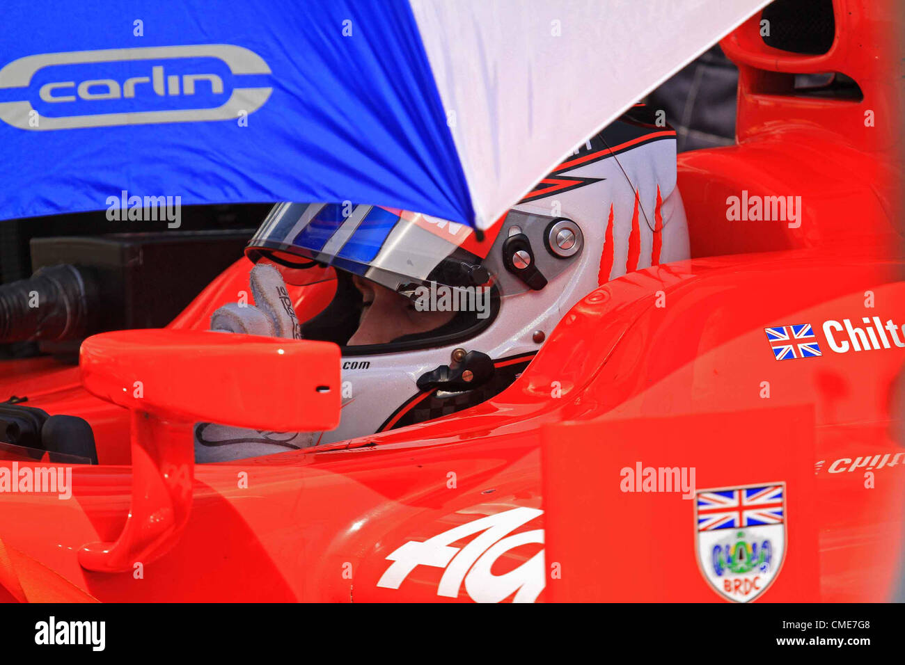 28.07.2012. Budapest, Hungary. FIA GP2  Motor racing.  Max Chilton on grid with eyes closed in concentration Stock Photo