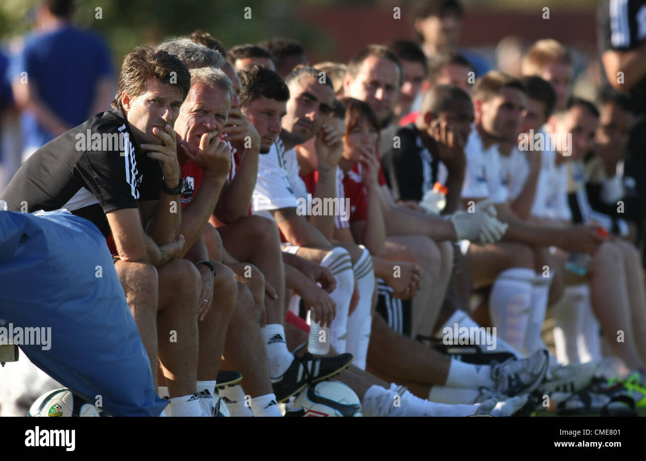 MICHAEL LAUDRUP SAT ON THE BEN SWANSEA CITY A.F.C. MANAGER OXNARD CALIFORNIA USA 28 July 2012 Stock Photo