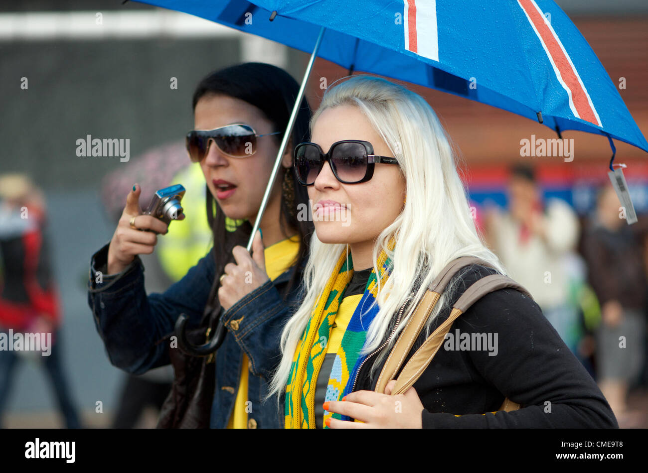 Two Brazilian fans outside Old Trafford, Manchester United's ground, where Olympic Football matches  will be played later in the afternoon.Brazil v Belarus will be followed by Egypt v New Zealand. Manchester, UK 29-07-2012 Stock Photo