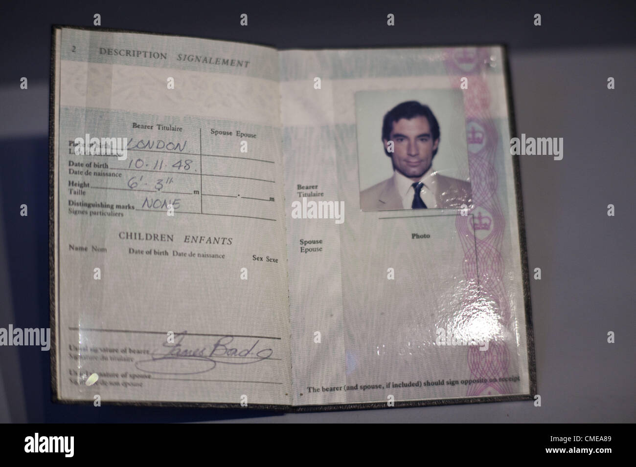July 27, 2012 - London, UK - Designing 007 - Fifty Years of Bond Style.Bond's passport (Timothy Dalton).The Barbican marks the 50th anniversary of the James Bond franchise, from 1962's Dr No to this year's Skyfall, with a unique exhibition showcasing the inside story of the design and style of the world's most influential and iconic movie brand. It explores the craft behind the screen icons, the secret service and villains, tailoring and costumes, set and production design, automobiles, gadgets and special effects, graphic design and motion graphics, exotic locations, stunts and props, London, Stock Photo