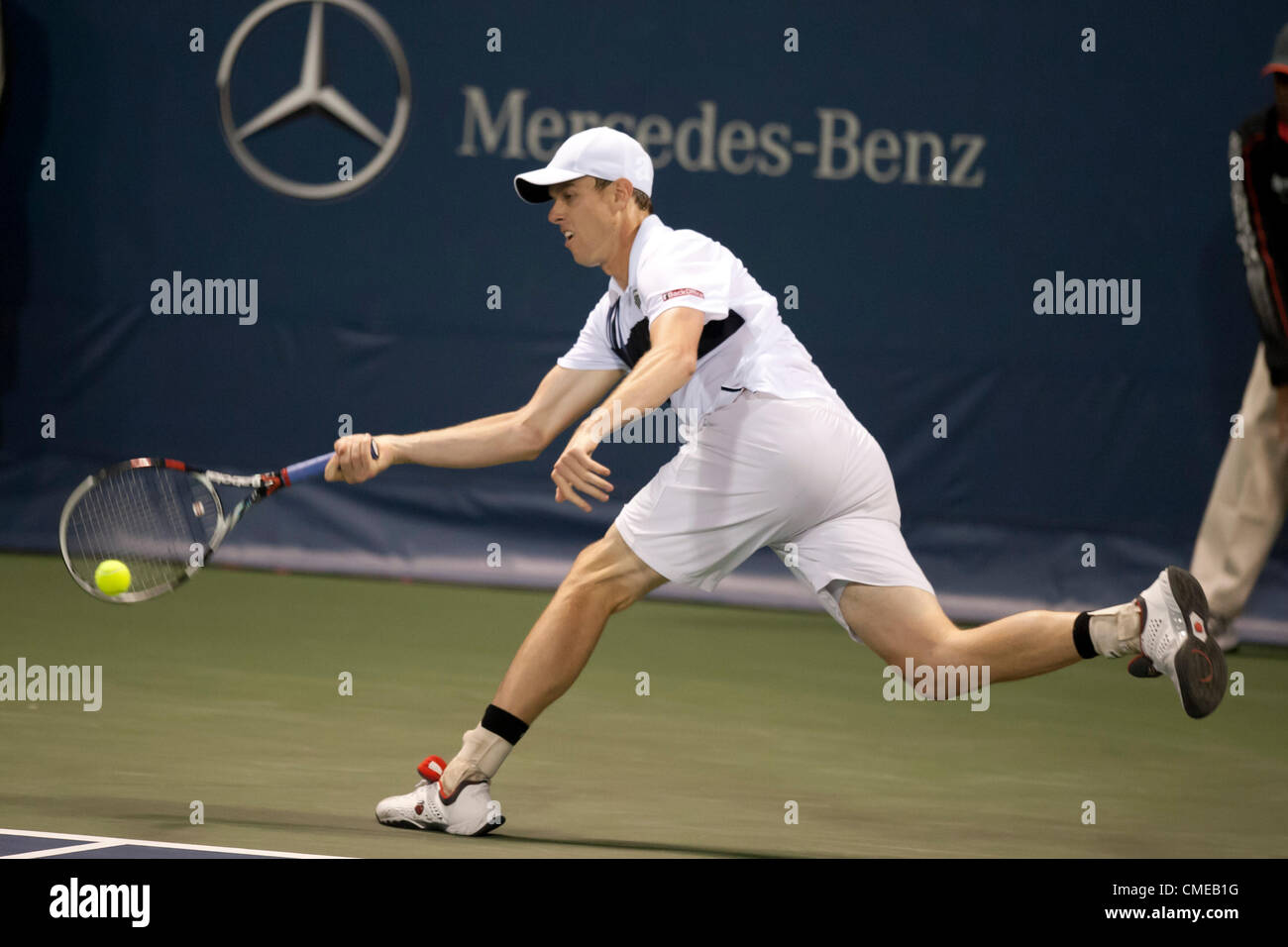 LOS ANGELES, CA - JULY 28: Sam Querrey in action during Day 6 of the Farmers Classic presented by Mercedes-Benz at the LA Tennis Center on July 28, 2012 in Los Angeles, California. Stock Photo