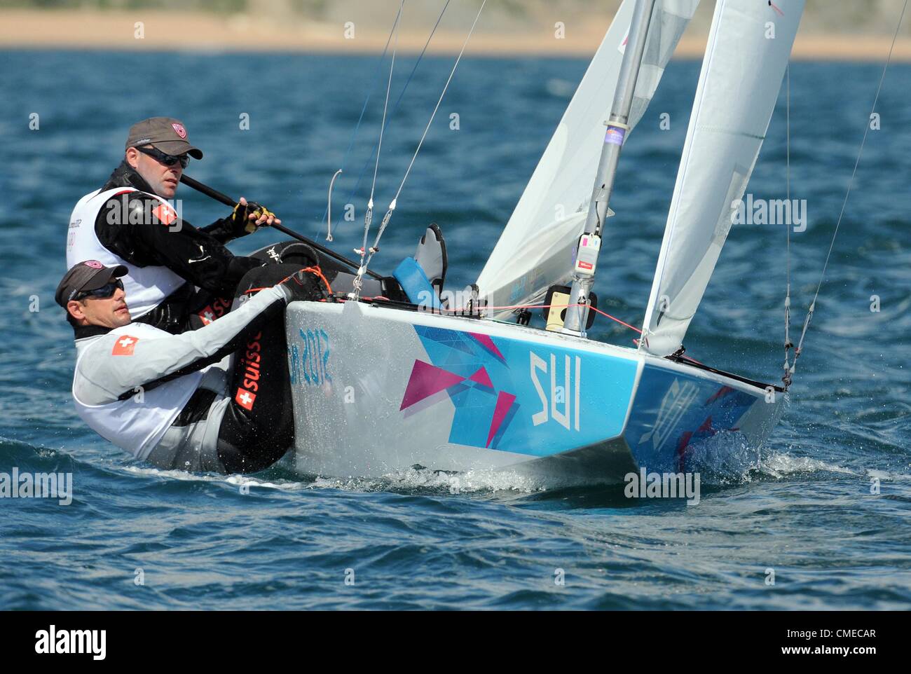 Olympic Sailing, action during the London 2012 Olympic Games at the Weymouth & Portland Venue, Dorset, Britain, UK.  Swiss sailors Flavio Marazzi and Enrico de Maria in the Star sailing class , July 29, 2012 PICTURE: DORSET MEDIA SERVICE Stock Photo