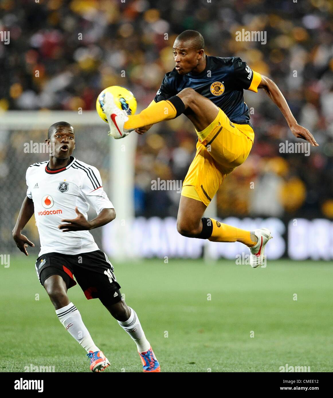 Johannesburg South Africa July 28 Sifiso Myeni And Jimmy Jambo During The Carling Black Label Cup Match Between Orlando Pirates And Kaizer Chiefs At Fnb Stadium On July 28 2012 In