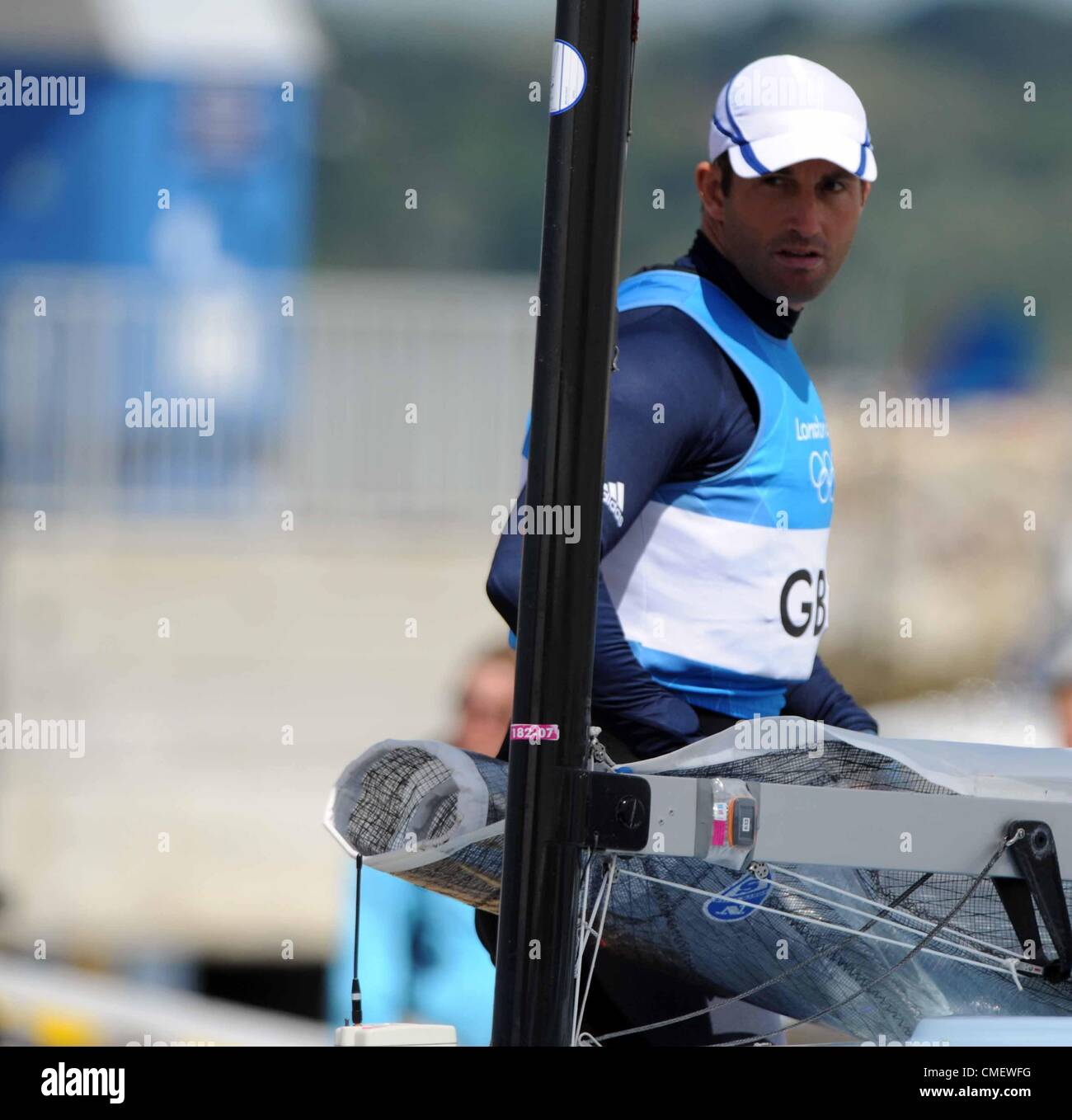 Ben Ainslie getting his boat prepared for the second day of Olympic Finn Class racing today (Mon) at Portland Dorset.  PICTURE BY: DORSET MEDIA SERVICE Stock Photo