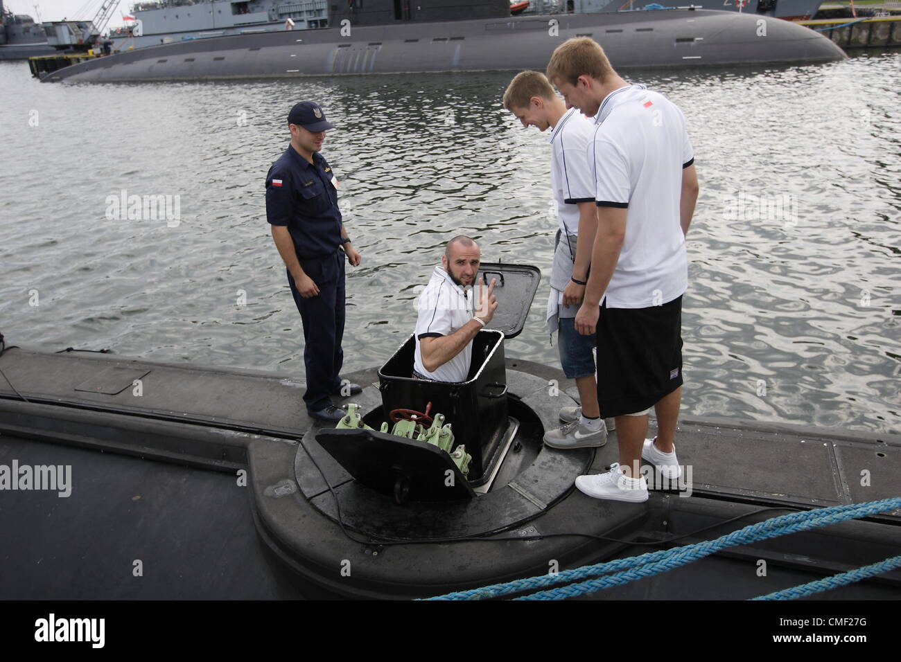 Gdynia, Poland 1st, August 2012 The only Pole in the NBA (Phoenix Suns) visit Polish Naval Base in Gdynia.  Marcin Gortat visited two Polish submarines - ORP Orzel , and ORP Sokol, and also naval rocket frigate. Stock Photo