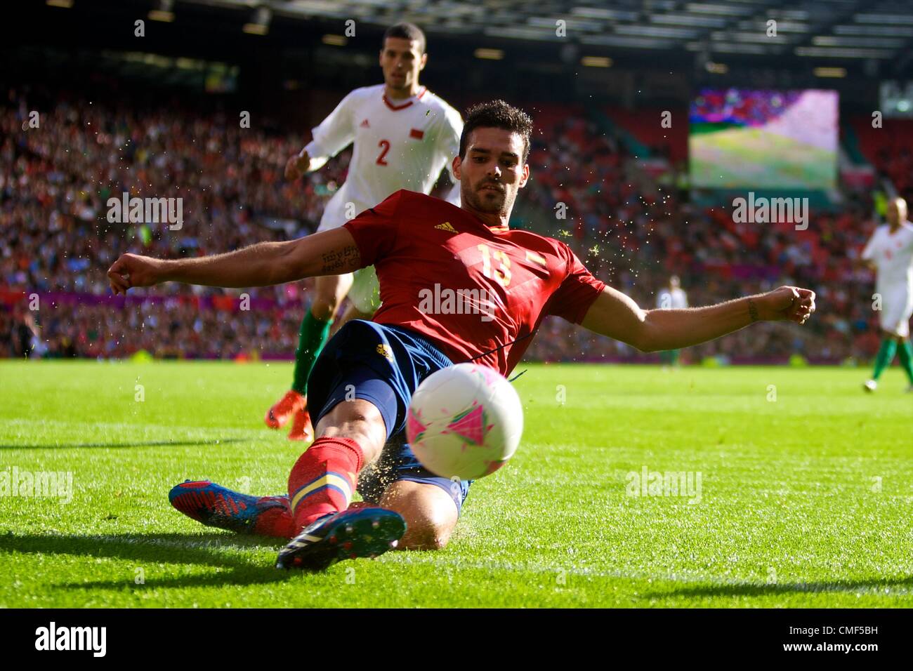01.08.2012 Manchester, England. Spain defender Alberto Botía in action during the third round group D mens match between Spain and Morocco at Old Trafford. Stock Photo