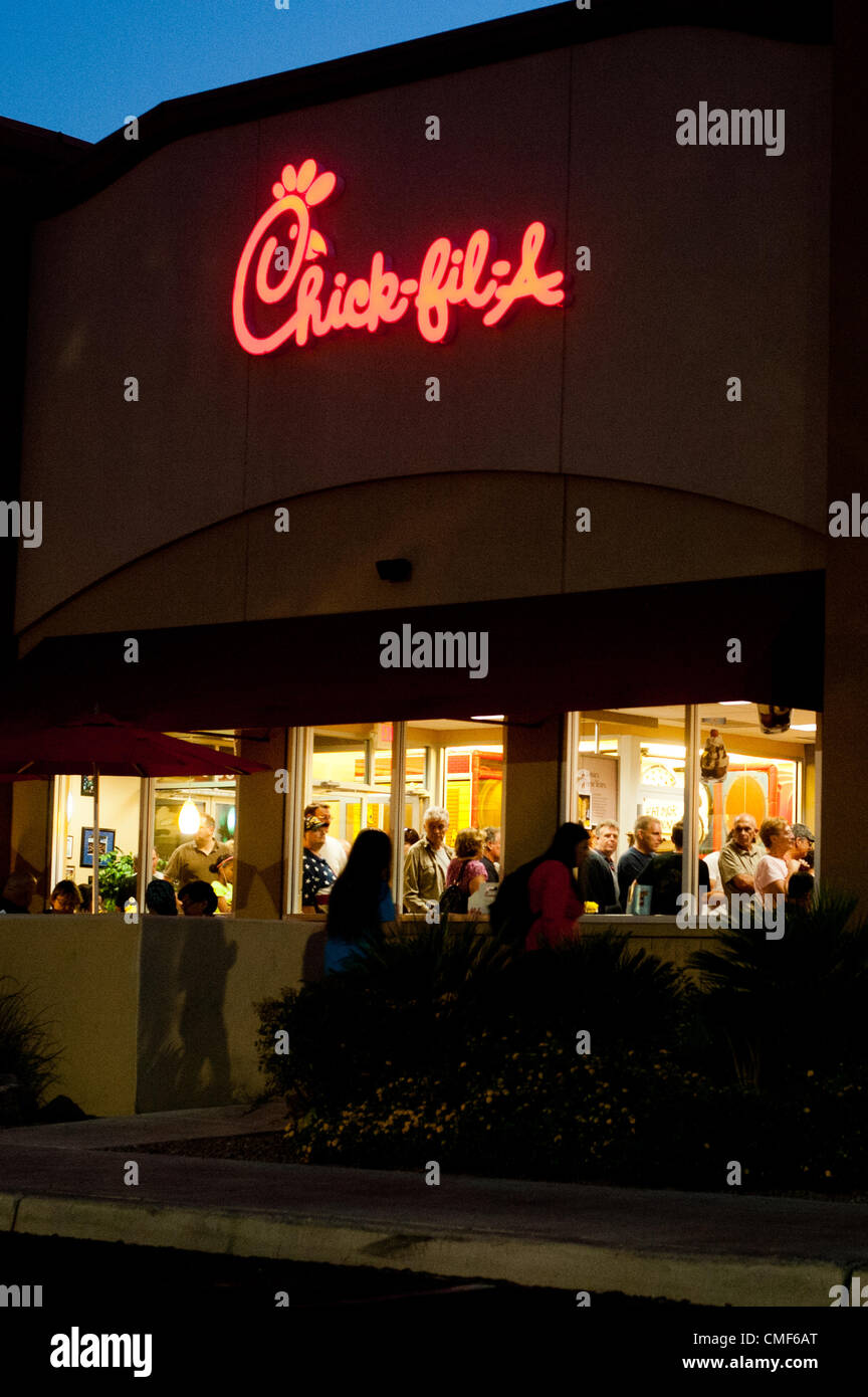 Aug. 1, 2012 - Tucson, Arizona, U.S - Scores of people filled a mid-town Tucson, Ariz. Chick-fil-A restaurant, an American chicken sandwich shop chain, causing up to a two-hour wait for service on a day called Chick-fil-A Appreciation Day.  The company's founder and COO ruffled feathers in the last few weeks over a statement he made against gay marriage - a move that alienated many.  To combat this effect, other people have rallied around the chain, filling restaurants all around the nation with customers supporting the business, and, ostensibly, the views of its founder. (Credit Image: © Will Stock Photo
