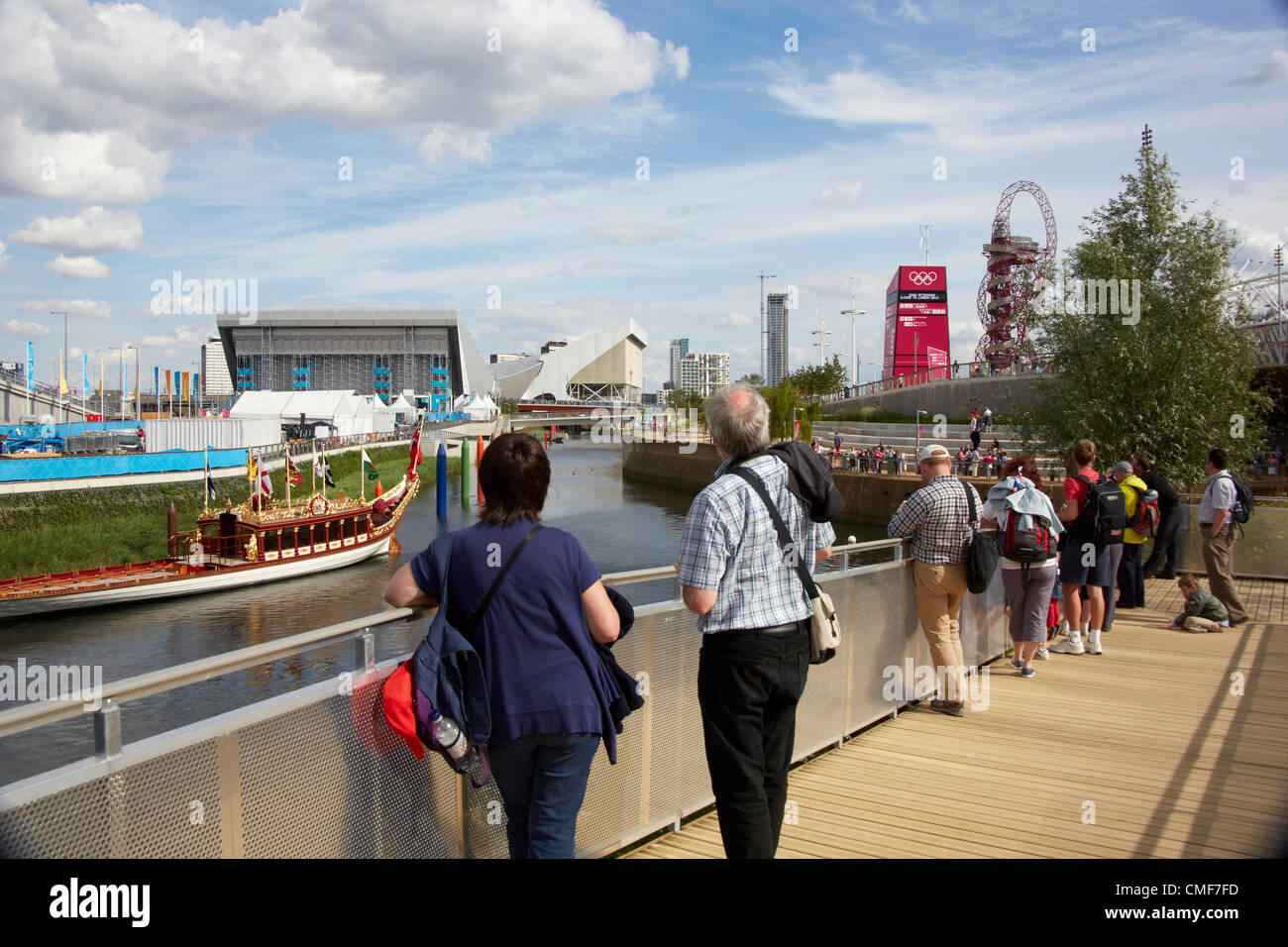 People by River Lea with Royal Barge, Arenas and Orbit at Olympic Park, London 2012 Olympic Games site, Stratford London E20 UK, Stock Photo