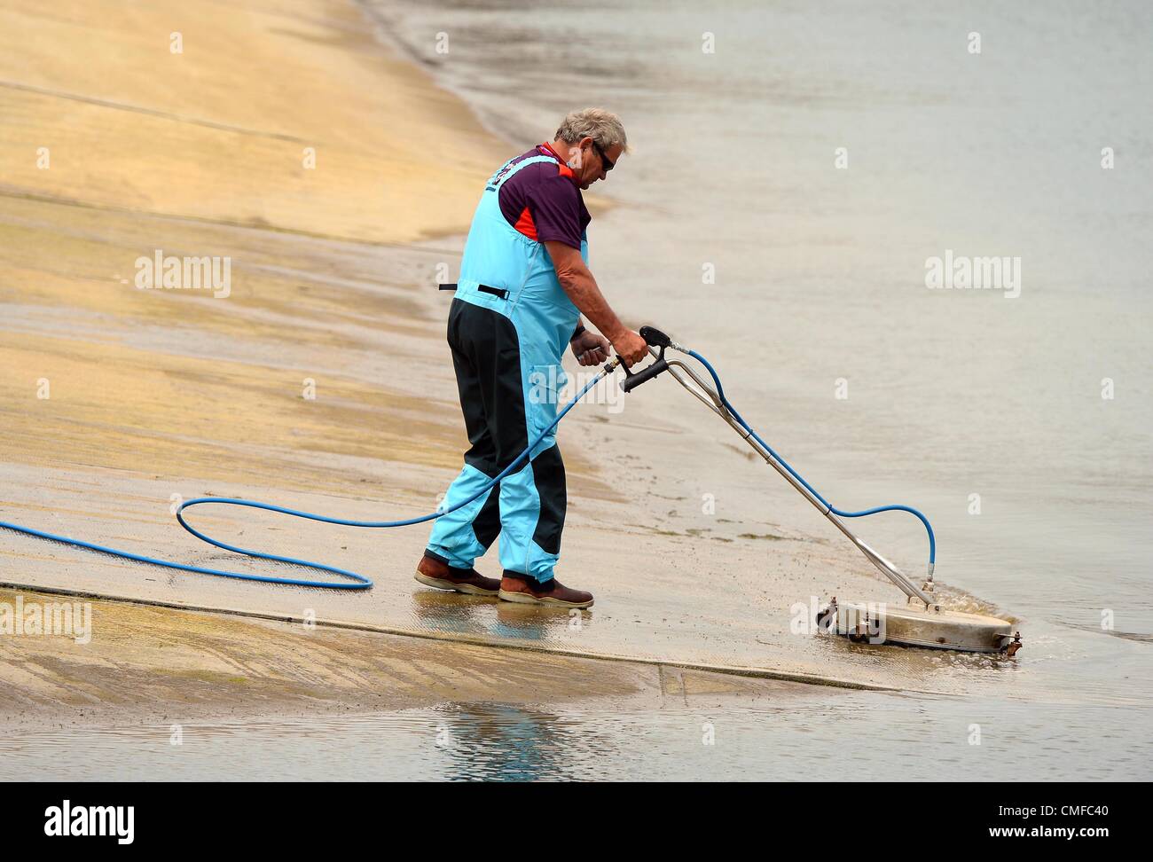 Cleaning a boating slipway, UK Stock Photo Alamy