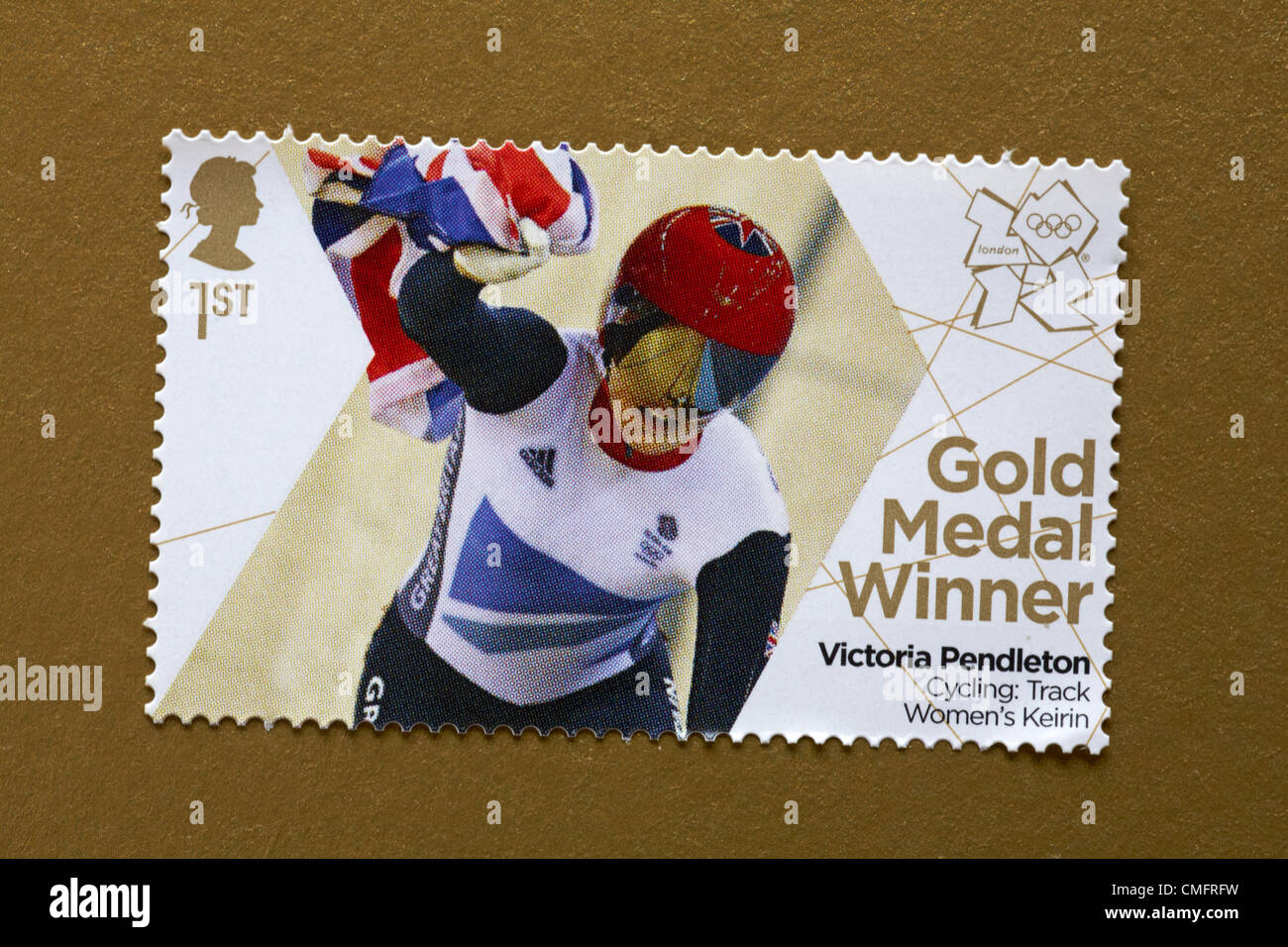 UK Saturday 4 August 2012. Stamp to honour gold medal winner Victoria Pendleton in the Cycling Track Women's Keirin event. Stamp purchased and stuck on gold to send to Olympic supporter. Stock Photo