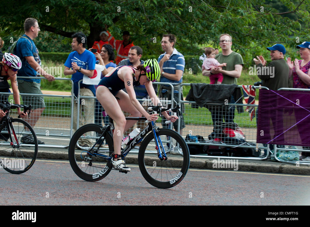 London, UK, Saturday 4th August 2012.  Great Britain's Lucy Hall leads the cycling stage of the women's triathlon in London's Hyde Park. The race was finally won by Switzerland's Nicola Spirig, picking up gold, with Sweden's Lisa Norden placing second and the silver medal and Australia's Erin Densham placing third and the bronze. Stock Photo