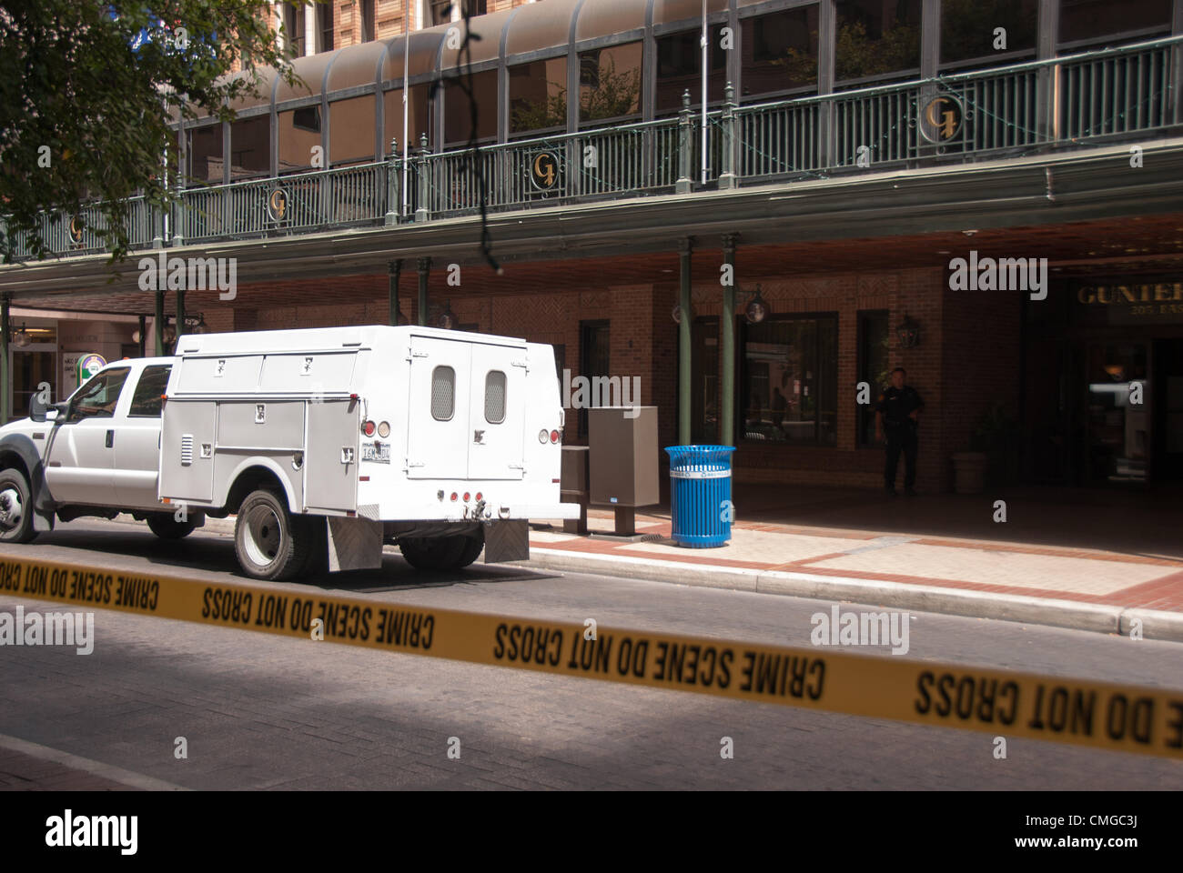 6 August 2012 San Antonio, Texas, USA - San Antonio police officers guard the streets around the Gunter Hotel in San Antonio, Texas. A bomb threat had been called in at 11:00 a.m., guests were evacuated immediately and the surrounding streets were blocked. Stock Photo