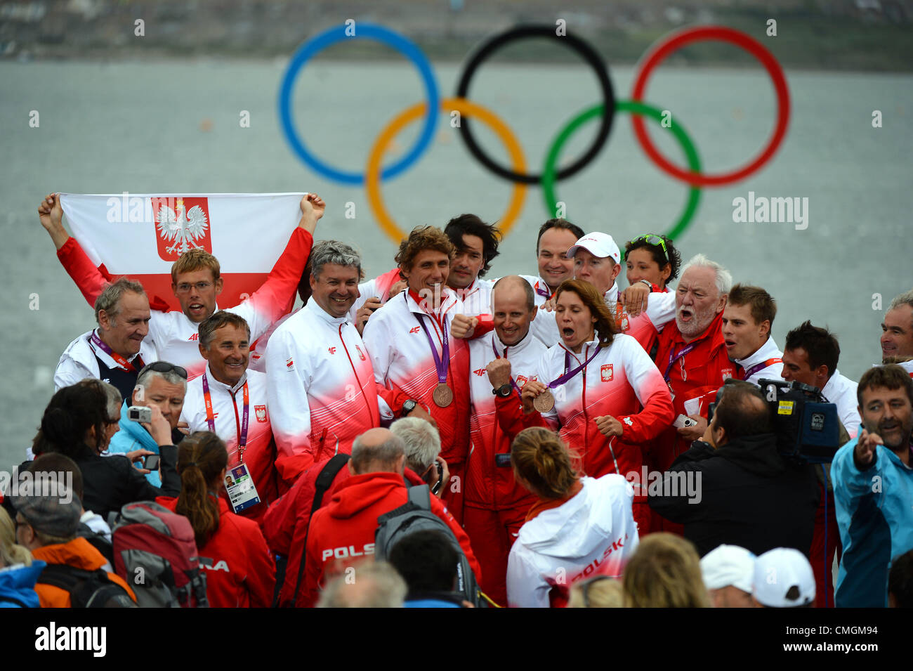 Olympic Sailing, action during the London 2012 Olympic Games at the Weymouth & Portland Venue, Dorset, Britain, UK.  Poland team celebrate at the medal ceremony August 7th, 2012 PICTURE: DORSET MEDIA SERVICE Stock Photo