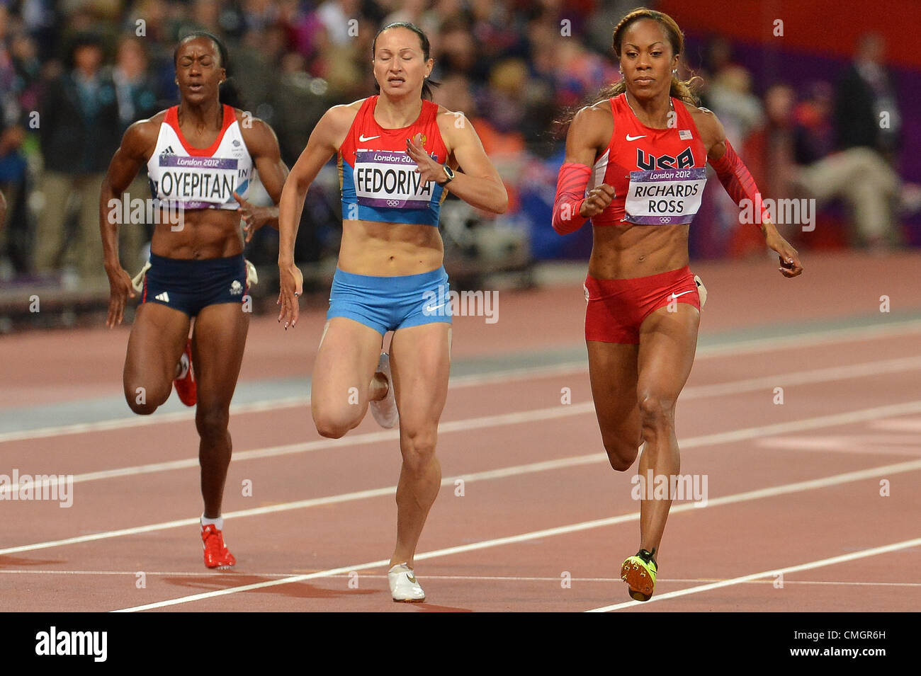 LONDON, ENGLAND - AUGUST 7, Sanya Richards-Ross of the USA beats Aleksandra Fedoriva of Russia in the womens 200m semi final during the evening session of athletics at the Olympic Stadium on August 7, 2012 in London, England Photo by Roger Sedres / Gallo Images Stock Photo