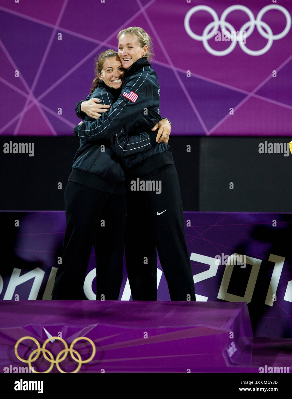 Aug. 8, 2012 - London, England, United Kingdom - Gold medallists Misty May-Treanor and Kerri Walsh-Jennings (USA),  show their emotions on the awards stand after winning their 3rd gold medal in Beach Volleyball game in the London Olympics 2012 at the Horse Guards Parade on August 08, 2012 in London, United Kingdom. (Credit Image: © Paul Kitagaki Jr./ZUMAPRESS.com) Stock Photo