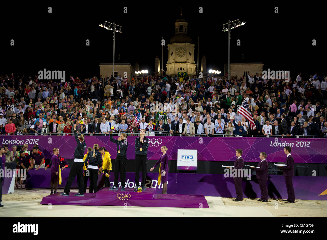 Aug. 8, 2012 - London, England, United Kingdom - Gold Medallist Kerri Walsh-Jennings (USA) looks to the sky after the awards ceremony. Misty May-Treanor and Kerri Walsh-Jennings, Jennifer Kessy and April Ross (USA) walks off the awards stage in Beach Volleyball game in the London Olympics 2012 at the Horse Guards Parade on August 08, 2012 in London, United Kingdom. (Credit Image: © Paul Kitagaki Jr./ZUMAPRESS.com) Stock Photo