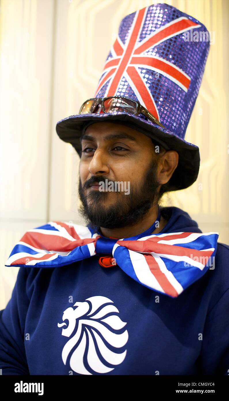 Aug. 8, 2012 - London, England, United Kingdom - Olympic visitor 'I.P.', from London, clad in patriotic British clothing, poses for a portrait in the Westfield Mall during the 2012 London Summer Olympics. (Credit Image: © Mark Makela/ZUMAPRESS.com) Stock Photo