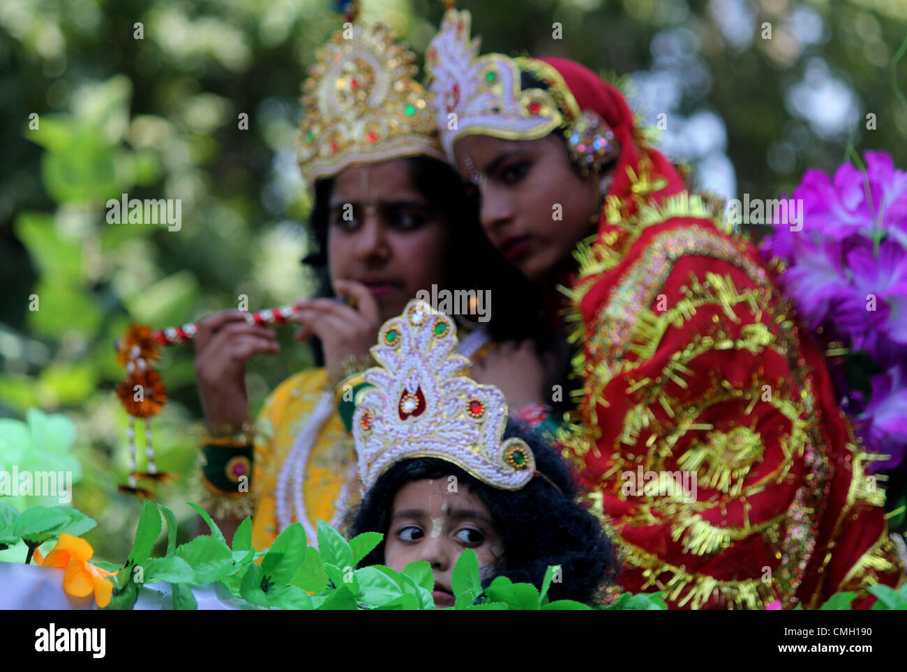 Aug. 9, 2012 - Children dressed as the Hindu Lord Krishna (R), and his consort Radha,(C) Neera, take part in a religious procession ahead of Janmashtami celebrations in Srinagar, the summer capital of indian kashmir on   9/8/ 2012. Janmashtami, the birth anniversary of Lord Krishna, falls on Friday..Photo/Altaf Zargar/Zuma Press (Credit Image: © Altaf Zargar/ZUMAPRESS.com) Stock Photo