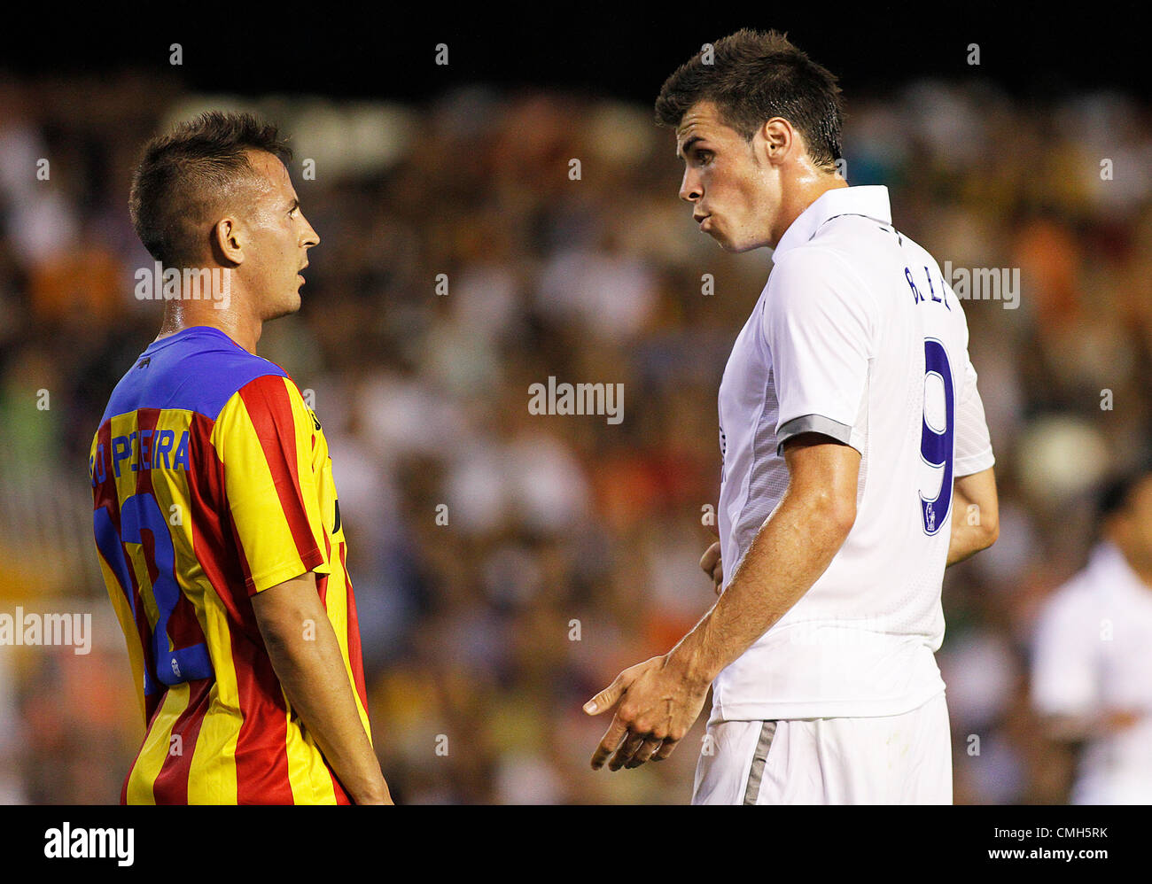 09/08/2012 - Friendly match pre season - Valencia CF vs. Tottenham Hotspurs - Estadio MESTALLA, Valencia, Spain - Gareth bale and Joao Pereira argueing Stock Photo