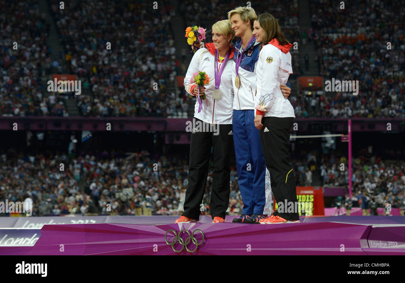 Left to right: silver medallist Christina Obergfoll (GER), winner Czech Republic's Barbora Spotakova and bronze medallist Linda Stahl (GER) during women's javelin threw victory ceremony during the athletics in the Olympic Stadium at the 2012 Summer Olympics, London, Britain, Friday, August 10, 2012. (CTK Photo/Michal Kamaryt) Stock Photo