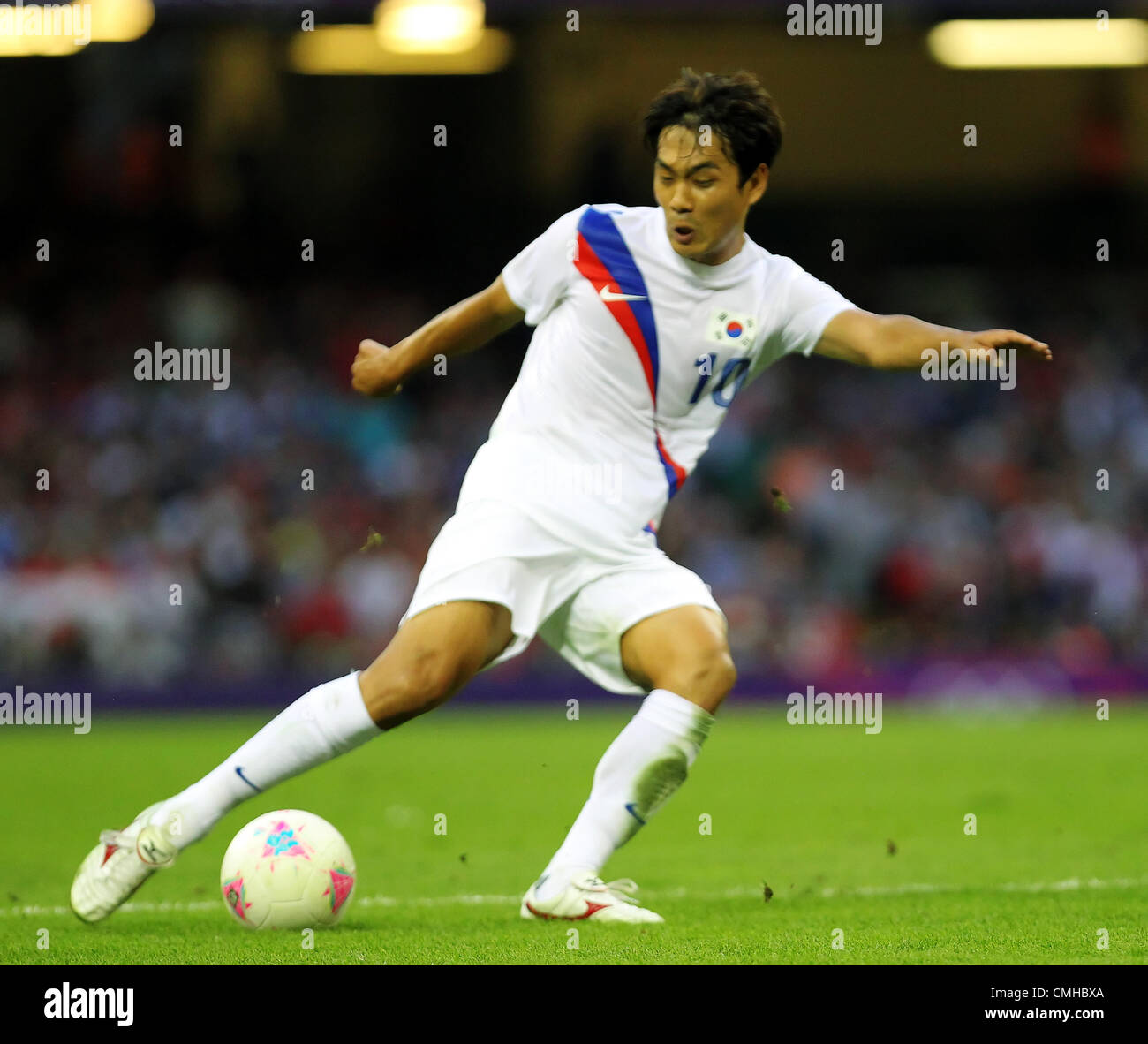10th Aug 2012. 10.08.2012 Cardiff, Wales. South Korea Forward Park Chu-Young (Arsenal) scores the goal to put South Korea into the lead during the Olympic Football Men's Bronze Medal Match between Japan and Republic of Korea. Stock Photo