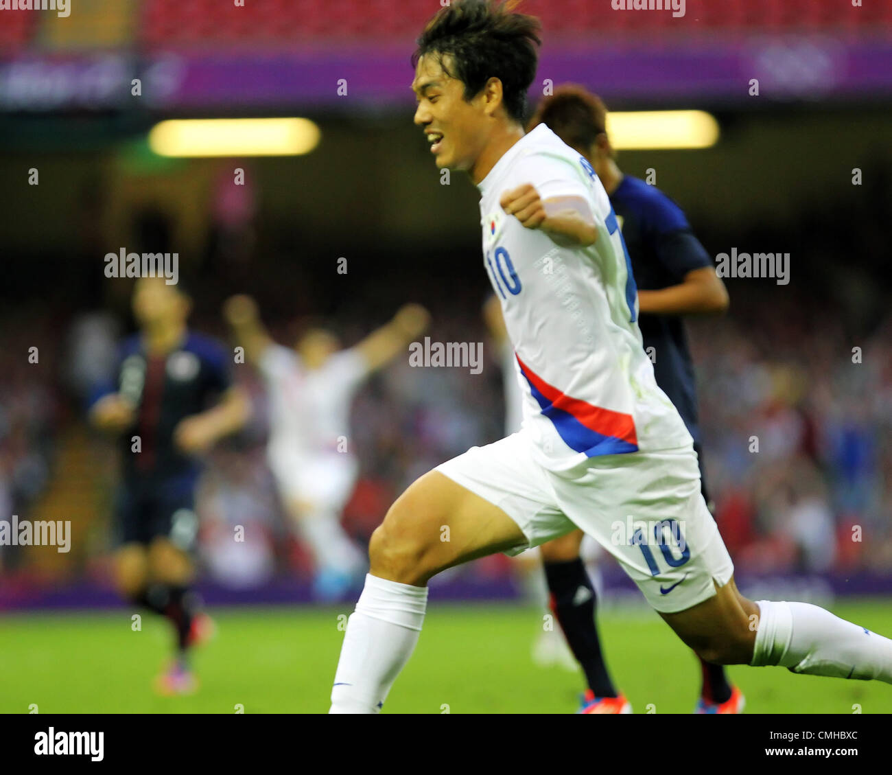 10th Aug 2012. 10.08.2012 Cardiff, Wales. South Korea Forward Park Chu-Young (Arsenal) scores a goal to put South Korea into the lead and then celebrates with his team mates during the Olympic Football Men's Bronze Medal Match between Japan and Republic of Korea. Stock Photo
