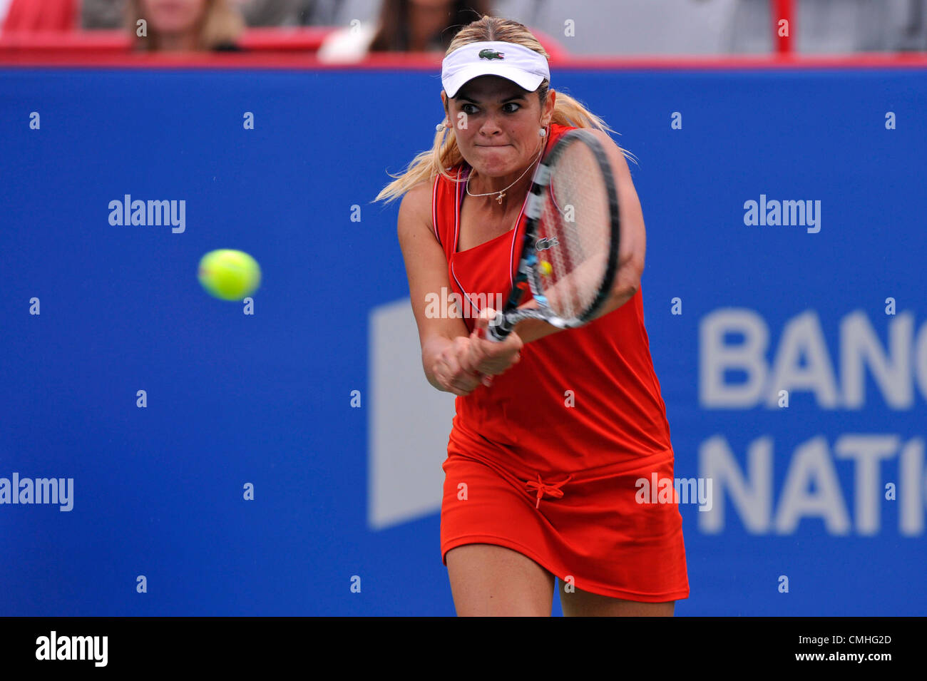 10th Aug 2012. 10.08.2012. Quebec, Canada.  Aleksandra Wozniak of Canada hits a return against Christina McHale of the USA during the Rogers Cup Presented By National Bank at Uniprix Stadium in Montreal, Quebec, Canada.  Game has been suspended due to rain. Stock Photo