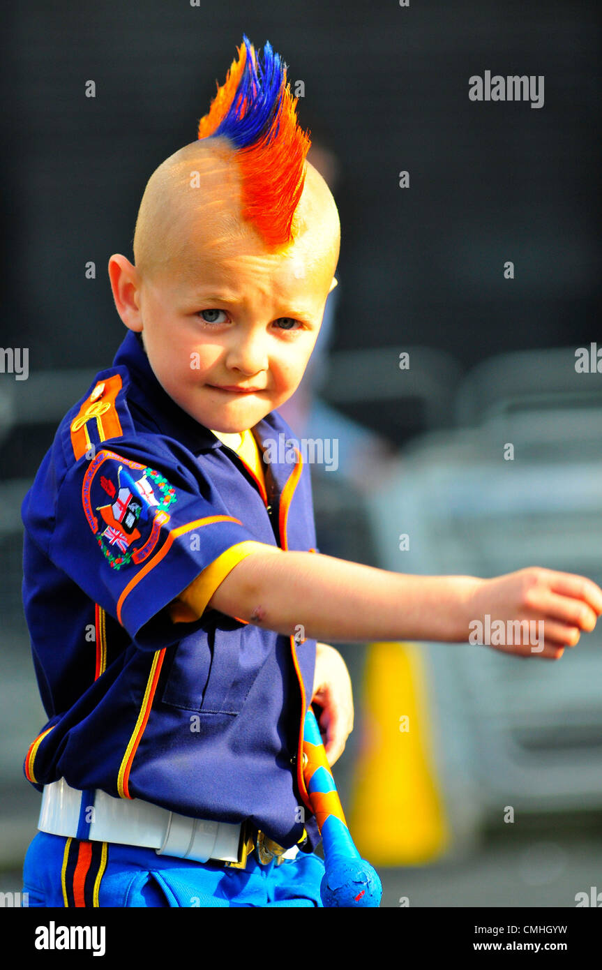 11 August 2012, Londonderry.Young bandsman with colourful spiked hair during loyalist parade. 10,000 Apprentice Boys of Derry and 120 bands took part in the annual Relief of Derry parade, the largest Loyal order parade held in Northern Ireland. Credit:  George Sweeney / Alamy Live News Stock Photo