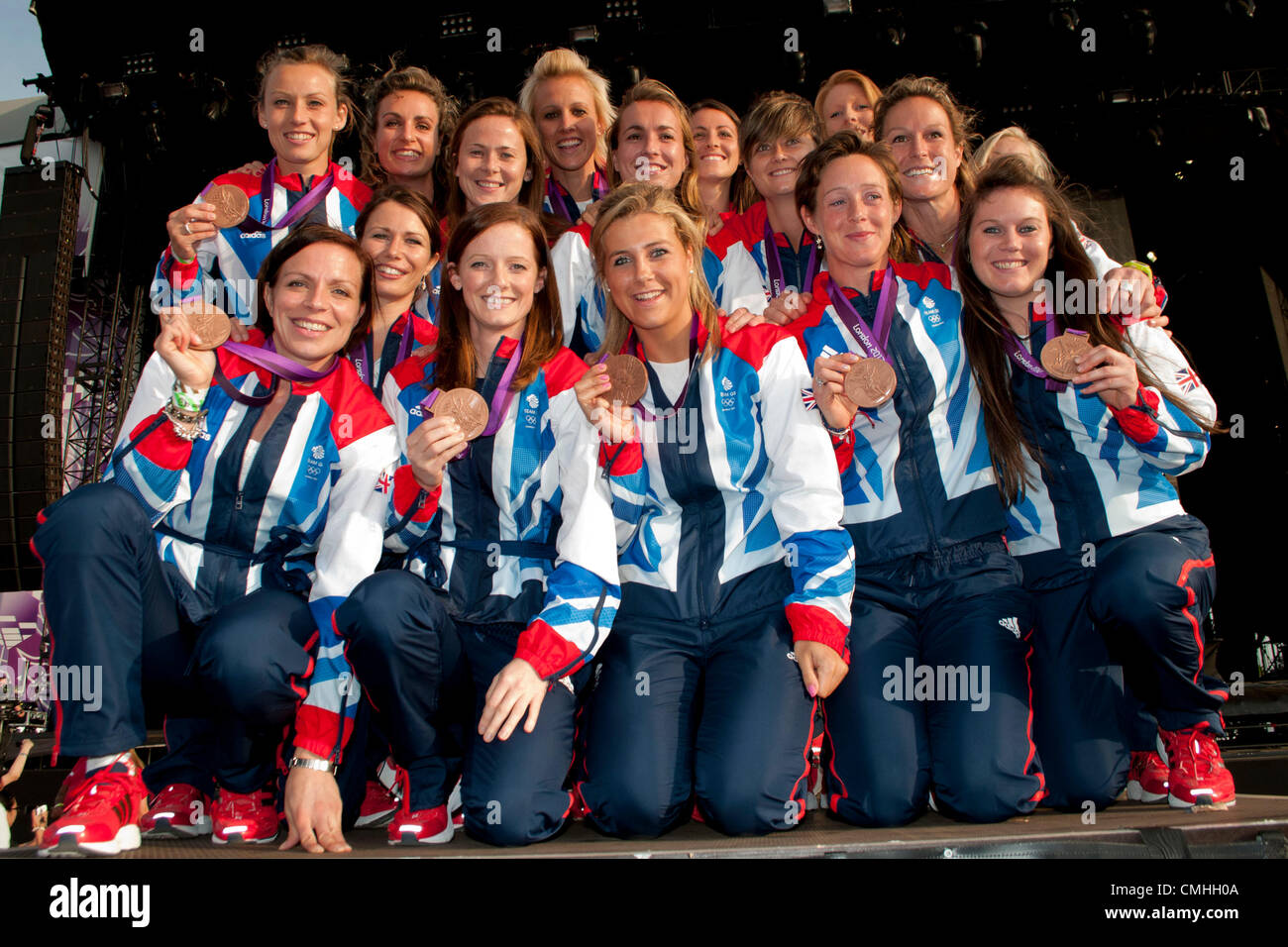 11th Aug 2012. Team GB Women's Hockey squad show off  their Olympic Bronze medals at BT London Live in Hyde Park. Credit:  Pete Maclaine / Alamy Live News Stock Photo