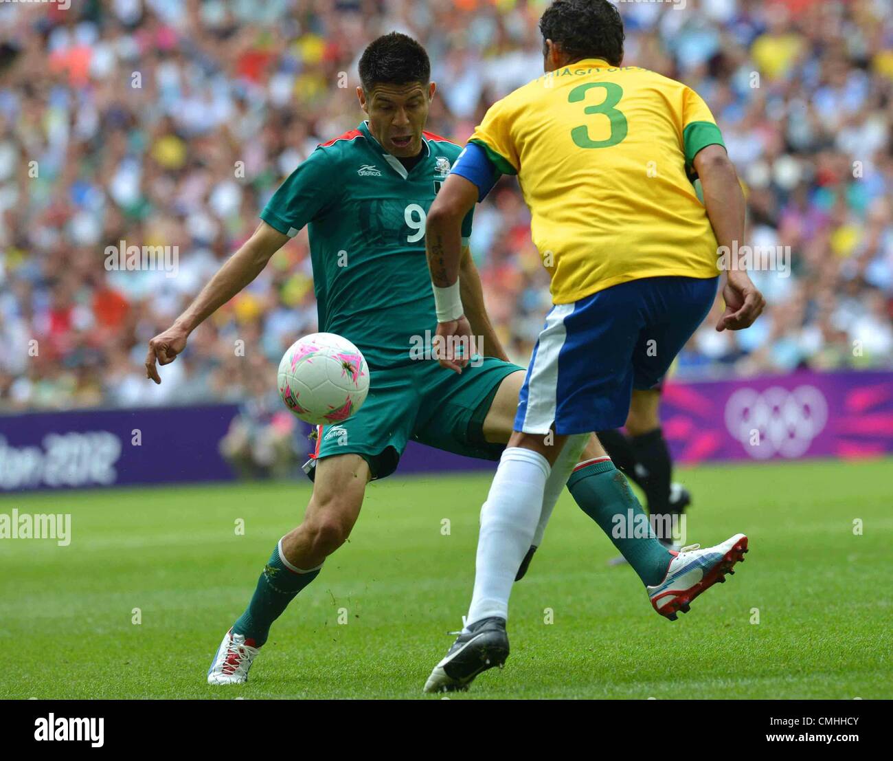 11.08.2012. Wembley Stadium, London, England. Oribe Peralta of Mexico challenges  for The Ball during Mens Football Gold Medal Match between Brazil and Mexico  London 2012 Olympic Games  Mexico Won The Match 2 1 and Won the Gold Medal Stock Photo