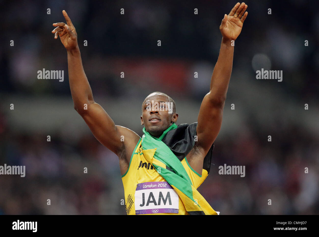 11.08.2012. London England. Usain Bolt of Jamaica celebrates after winning the Men's 4 x 100m Relay final of the  in Olympic Stadium at the London 2012 Olympic Games, London. Usain Bolt, anchoring the team helped the Jamaican team win the gold medal in 36.84 seconds setting a new world record. Stock Photo