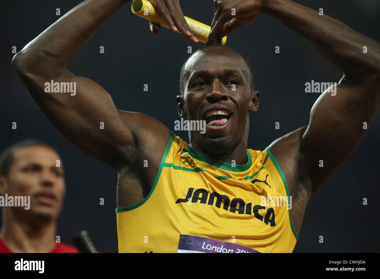 11.08.2012. London England. Usain Bolt of Jamaica celebrates after winning the Men's 4 x 100m Relay final of the  in Olympic Stadium at the London 2012 Olympic Games, London. Usain Bolt, anchoring the team helped the Jamaican team win the gold medal in 36.84 seconds setting a new world record. Stock Photo