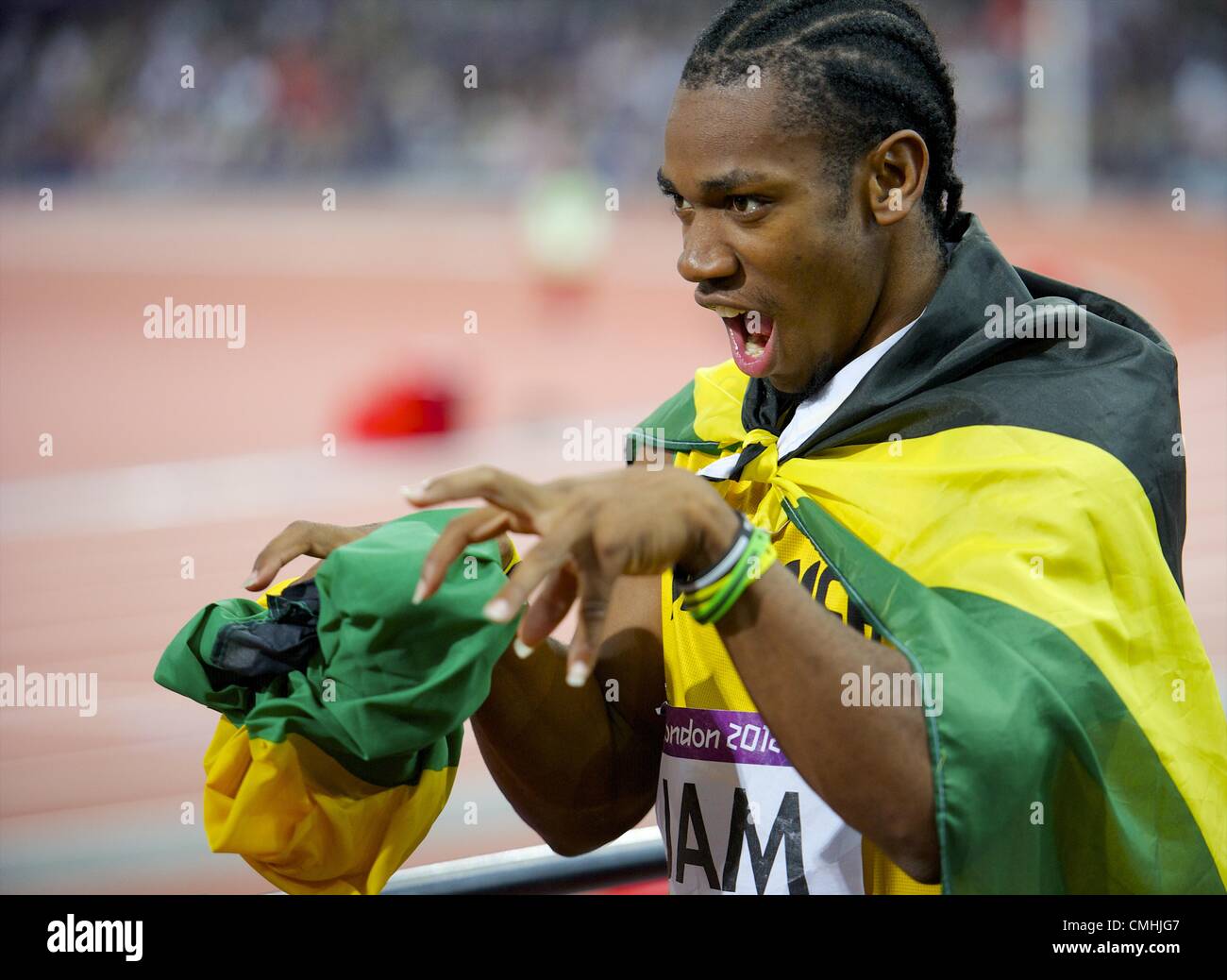 Aug. 11, 2012 - London, England, United Kingdom - YOHAN BLAKE, a member of the Jamaican 4x100m relay team, poses for the cameras after winning gold and setting a new world record of 36.84 seconds during the 2012 London Summer Olympics. (Credit Image: © Mark Makela/ZUMAPRESS.com) Stock Photo