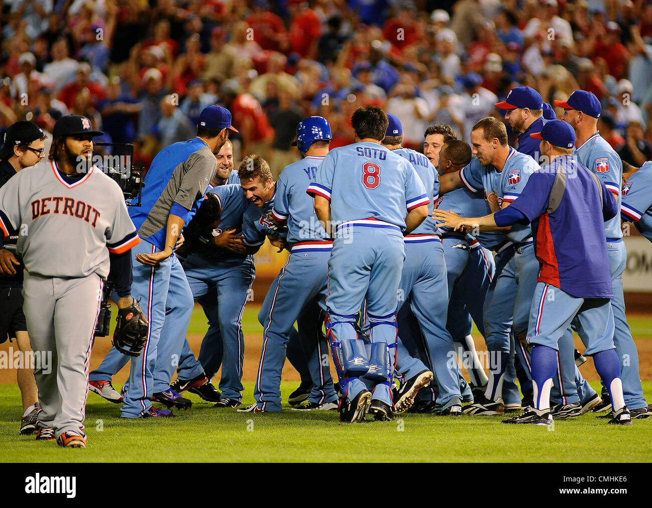 Aug. 11, 2012 - Arlington, Texas, USA - August 11, 2010 Arlington, Tx. USA. Texas Rangers MIKE OLT (center) is mobbed after hitting a walk off single in the ninth inning as the Texas Rangers defeated the Detroit Tigers 2 to 1 in a Major League Baseball game at The Ballpark in Arlington, Texas. (Credit Image: © Ralph Lauer/ZUMAPRESS.com) Stock Photo