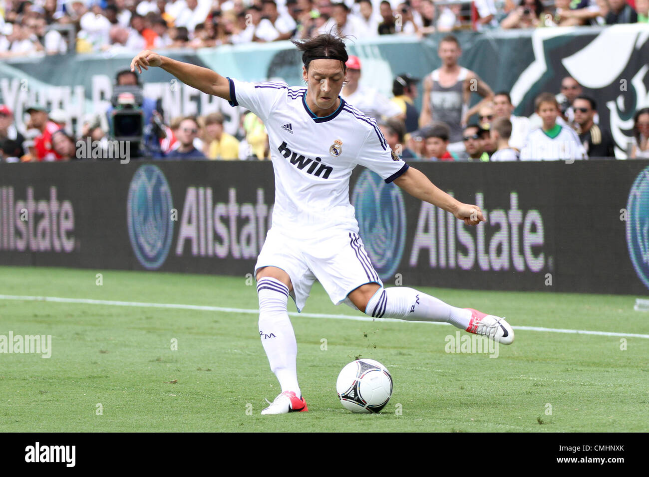 11.08.2012. Philadelphia, USA.  Real Madrid midfielder Mesut Ozil (10) kicks the ball on net during the World Football Challenge match between Real Madrid and Celtic FC at Lincoln Financial Field in Philadelphia, PA. Real Madrid defeated Celtic 2-0. Stock Photo