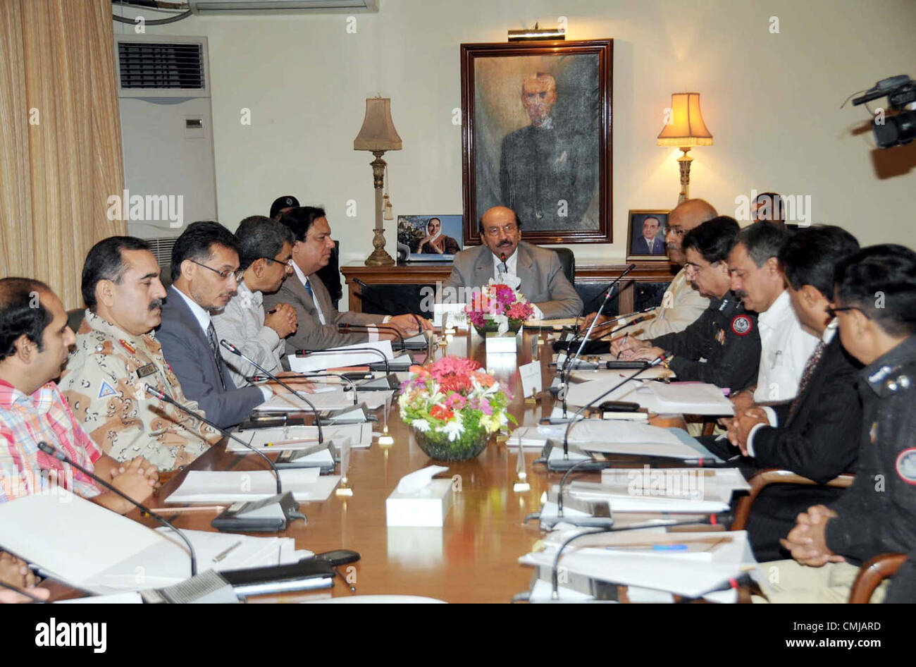 Sindh Chief Minister, Syed Qaim Ali Shah presides over a  meeting regarding security of Central Prison Karachi, at CM House in Karachi on Wednesday,  August 15, 2012. Stock Photo