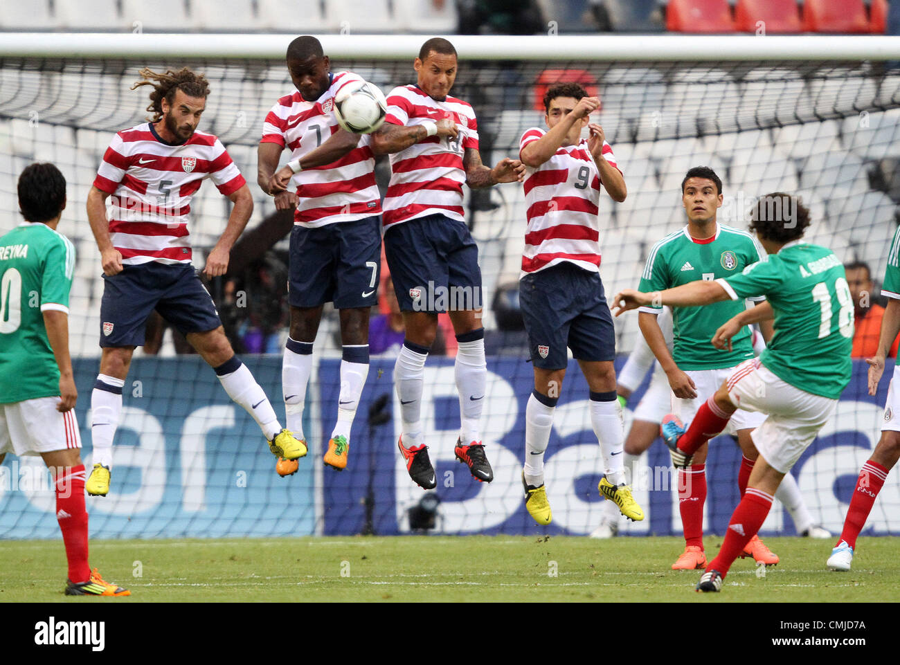 15th Aug 2012. 15.08.2012. Mexico City. Mexico.  Andres Guardado (MEX) (18) has his shot blocked by a wall of Kyle Beckerman (USA) (5), Maurice Edu (USA) (7), Jermaine Jones (USA) (13), and Herculez Gomez (USA) (9). The United States Men's National Team defeated the Mexico Men's National Team 1-0 at Estadio Azteca in Mexico City, Mexico in an international friendly soccer match. © Action Plus Sports Images / Alamy Live News Stock Photo