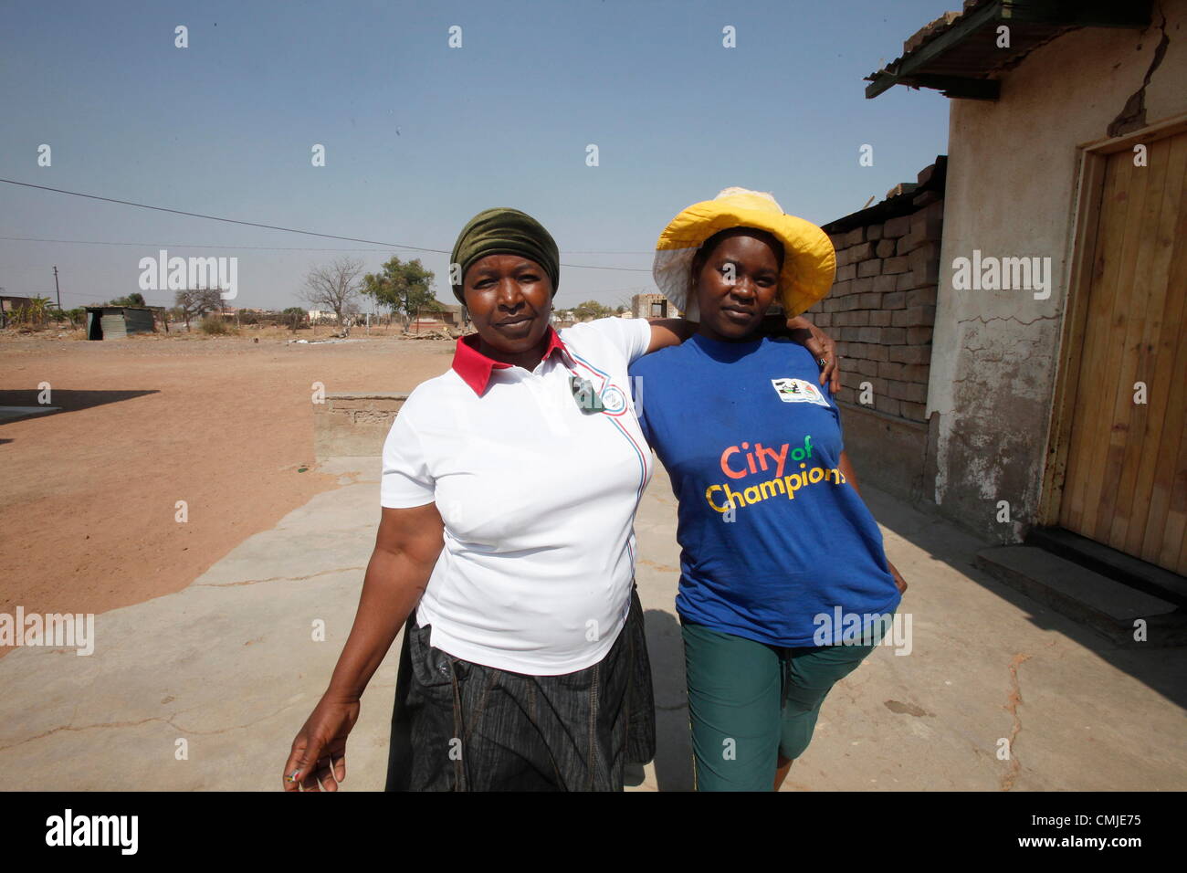 15th Aug 2012. LIMPOPO, SOUTH AFRICA: Dorcus Semenya mother of athlete Caster Semenya with her daughter Mamoraba outside her home on August 15, 2012 in Limpopo, South Africa. Dorcus discussed her trip to the London Olympics to see her daughter compete and admitted that watching Caster in the final was unnerving. (Photo by Gallo Images / The Times / Sydney Seshibedi) Stock Photo